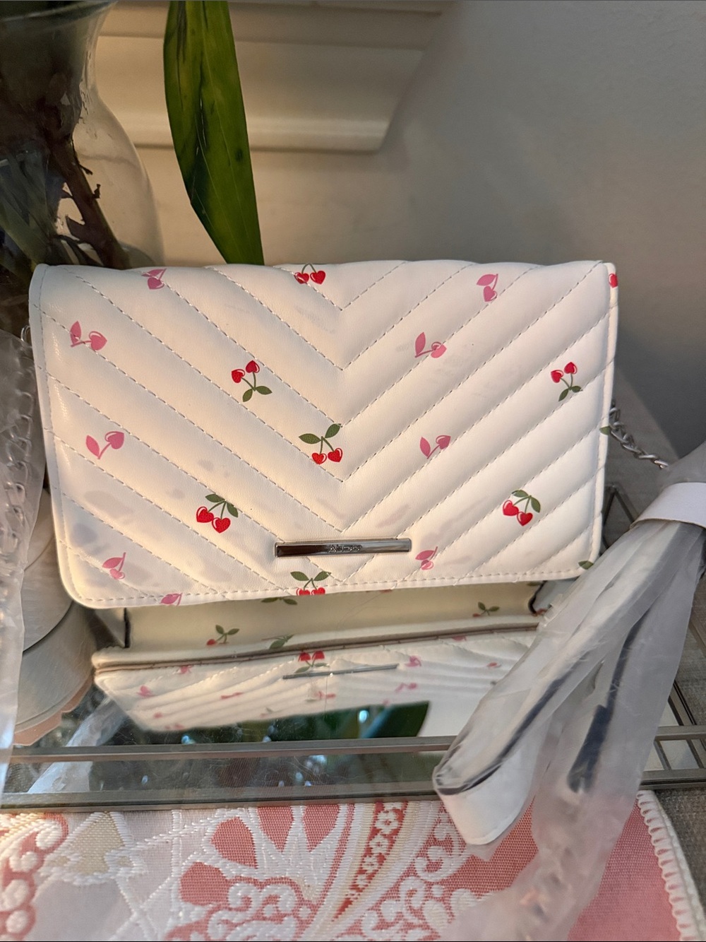 ALDO Cream Quilted Crossbody with Cherry Print - Picture 2 of 3